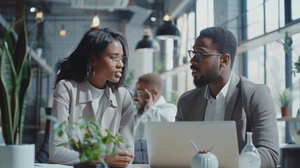 Poster - Business, Financial, and Marketing Projects are discussed by a young manager while using a laptop computer in the office. Specialists in a multidisciplinary team work together to achieve the goal.