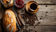 © Rogrio - A cup of coffee and bread on a table, surrounded by coffee beans, seen from above, on a rustic table, with space on the right for text.