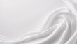 © meteo021 - White or light grey smooth fabric surface background. Elegant white silk with folds like waves. Light grey texture background.