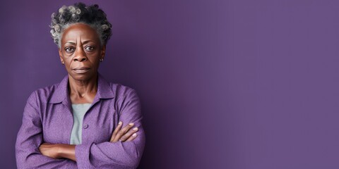 Lavender background sad black American independent powerful Woman. Portrait of older mid-aged person beautiful bad mood expression girl Isolated