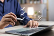 © GamePixel - Business performance monitoring and evaluation concept, Take an assessment, Business man using laptop and tablet online checklist survey, Filling out digital checklist, Questionnaire with checkboxes.