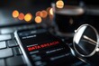 © Jouni - Phone with pop up showing text 'DATA BREACH'