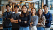 © ZzGooggiigz - Group of Asia young creative people in smart casual wear looking at camera and smiling in creative office workplace.Generative AI