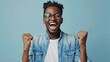© Bijac - ecstatic african american student celebrating online lottery win joyful success moment candid portrait photo
