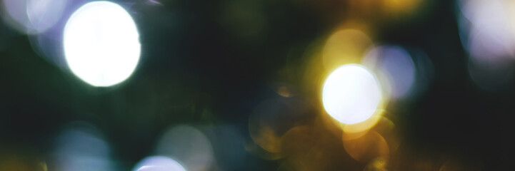 Wall Mural - Blurred lights abstract background, banner texture. Christmas holiday defocused bokeh header. Wide screen wallpaper. Panoramic web banner with copy space for design