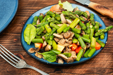 Wall Mural - Vegan asparagus and mushroom salad.