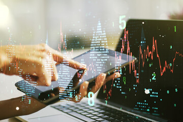 Poster - Abstract creative financial graph with finger clicks on a digital tablet on background, forex and investment concept. Multiexposure