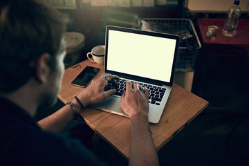 Poster - Man, laptop and screen with typing at night for research, working on table startup business. Male entrepreneur, computer and internet for web design in dark cafe for career, creative for branding