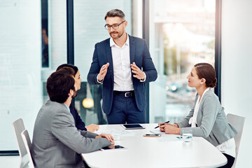 Poster - Businessman, meeting and discussion with team in office for planning, brainstorming and ideas on project deal for client. Group, man and staff with support for teamwork of work performance progress