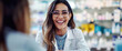 © Edgar Martirosyan - Female pharmacy worker smiling while talking to a customer in the store.