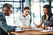 © peopleimages.com - Business people, writing and documents in meeting with team, negotiation or discussion in boardroom. Women, man and lawyer for agreement with signature, contract or collaboration at insurance agency