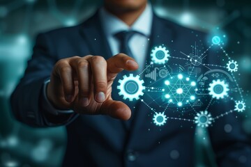 Leinwandbilder - Hand touching a digital interface with interconnected gears, symbolizing the intricate and innovative technology involved in modern digital systems and engineering mechanisms