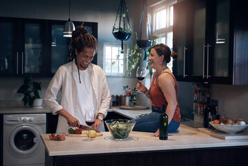 Poster - Couple, counter and cooking in kitchen at house for romantic dinner, lunch and date with love. People, happy and salad meal prep in home for happiness, wellness and eating food with alcohol or wine