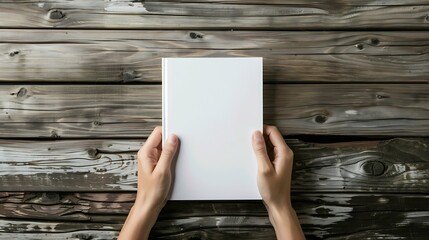 Aufkleber - Hands holding book in hard cover mock up on wood table : Generative AI