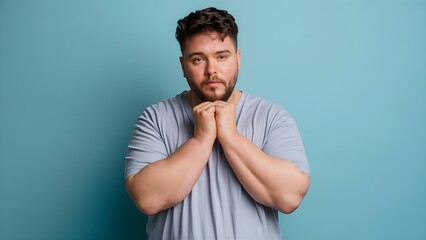 Wall Mural - plus size male model posing, with white aesthetic clothes, pastel blue background,