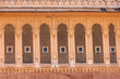 © SNEHIT PHOTO - Row of arched windows architecture of historic Junagarh Fort in Bikaner, Rajasthan, India.