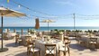 © Athena - Elegant outdoor dining setup on a terrace overlooking a serene beach with string lights and ocean view during the daytime