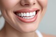 © SaroStock - Perfect healthy teeth smile of young woman in black background