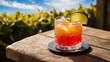 © Vipul - Glass of fresh cocktail with lime on wooden table