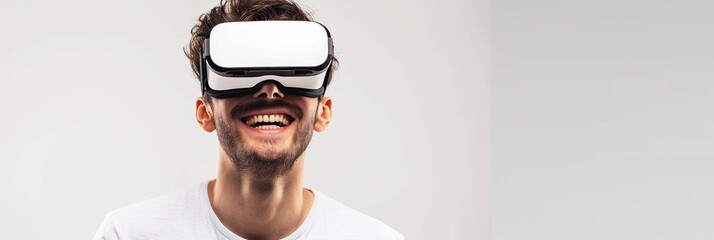 Fototapete - A man happily sporting virtual reality glasses, set against a flat white background, with room for text. Generative AI