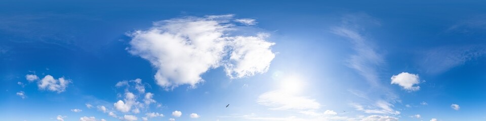 sky 360 panorama - bright blue sky filled with fluffy white cumulus clouds. seamless hdr spherical 3