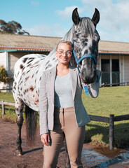 Wall Mural - Woman, standing and portrait with horse in outdoor for wellness, smile by farm house for exercise. Female jockey, pony and happiness for sport in countryside, workout with animal in Texas for health