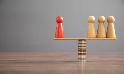 Wall Mural - Wooden human figure, coins on the table.