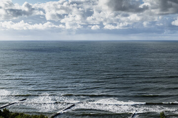 Wall Mural - baltic sea coastal view with breakwaters and shore water