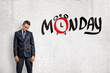 © gearstd - Man with gloomy expression under Monday drawing