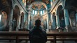 © Антон Сальников - A parishioner feeling the connection to the divinity sitting in a majestic old church, hoping and believing that salvation comes through goodness and kindness. A contemplative experience in a