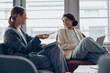 © Kostiantyn - Smiling woman office worker discussing new project with colleague during working day in coworking
