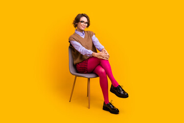 Sticker - Photo portrait of attractive young woman sit chair confident pose dressed retro office clothes isolated on yellow color background