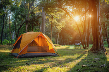 camping outdoors with lots of sunlight with one tent two outdoor camping chairs bbq rack.