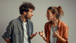 © Art-Park - young man and young woman couple arguing with hands and arms gesticulating, he couple gets angry and glares at each other, emotional body language.