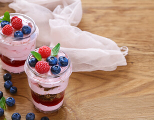 Sticker - dessert yogurt with fresh strawberries in a glass