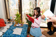 © Gemma can fly/Stocksy - Little girl opening Christmas gifts
