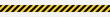 © Quirk Craft Studio - Warning tape with yellow and black diagonal stripes. Warn stop seamless line. Yellow and black caution tape border. Long danger ribbon. eps 10
