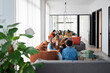 © Santi Nuñez/Stocksy - Casual business meeting in a vibrant workspace