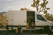 © Christine La/Stocksy - Vanlife lunch together in Joshua Tree National Park