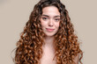 © nomad studio/Stocksy - Portrait of a young woman.
