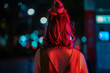 © Nibuya Qubik/Stocksy - portrait of young woman with her back to camera at night