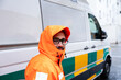 © Raul Navarro/Stocksy - Candid portrait of a paramedic on a work day
