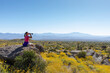 © Raymond Forbes LLC/Stocksy - Scottsdale Arizona thirsty woman drinking water spring  desert
