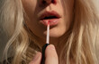 © Sonja Lekovic/Stocksy - Lips and lip gloss closeup