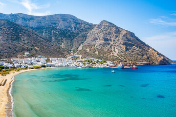 Wall Mural - View of Kamares port sea bay and village in mountain landscape, Sifnos island, Greece