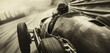 © Babb - A black and white photo of a race car driving down a track