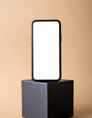 Poster - Mobile phone on cube podium for display of app - Mockup
