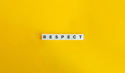 Wall Mural - Respect Word. Concept of Valuing Others' Opinions, Feelings, and Rights. Text on Block Letter Tiles on Yellow Background. Minimal Aesthetics.