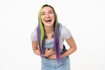 Excited emotional young caucasian teenage woman girl hipster with dyed colorful hair feeling amused laughing loud isolated in white background