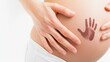 © Zhanna - A symbolic image of a pregnant belly with a handprint, denoting the connection between mother and child.